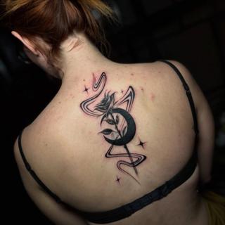 Blackwork floral crescent tattoo by @rranoraa