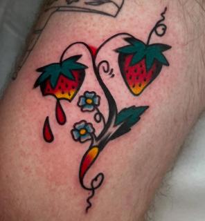 Traditional strawberries tattoo by @ellie_tattooer