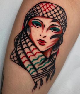 Traditional traditional woman tattoo by @ellie_tattooer