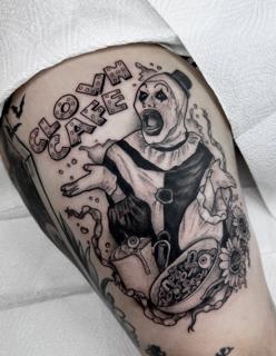 Blackwork creepy clown tattoo by @evxtattoo