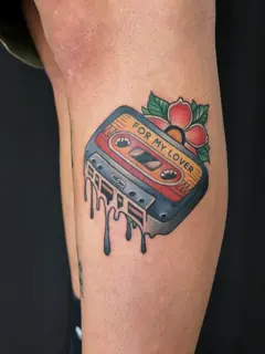 Traditional cassette tape tattoo by @evi.sv