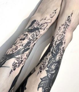 Blackwork abstract floral tattoo by @xema.tattoos