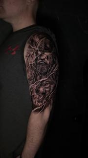 Realism viking and wolf tattoo by @GiafkaTattoo33