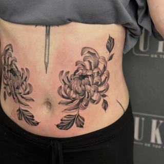 Blackwork chrysanthemum flowers tattoo by @justbethtattoo