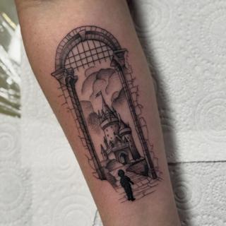 Blackwork castle scene tattoo by @justbethtattoo