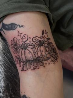 Blackwork floral pumpkin tattoo by @fiona_jay_tattoo