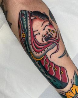 Traditional snake face tattoo by @fontascast