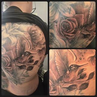 Realism hummingbird and flowers tattoo by @foxytattooartist