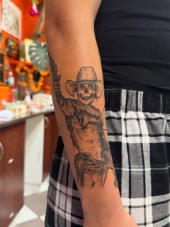 Blackwork skeleton cowboy tattoo by @gayle.inklore