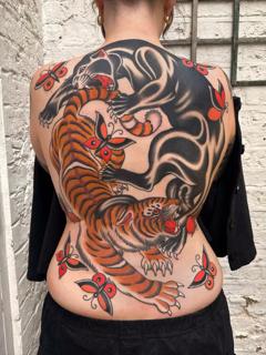 Traditional panther tiger butterflies tattoo by @gemcartertattoo