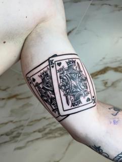 Traditional king playing cards tattoo by @gatostattoo_