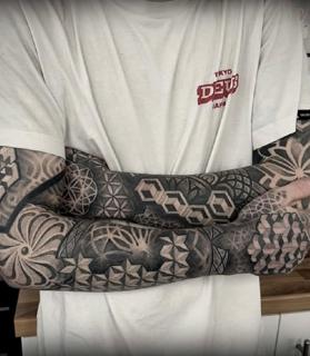 Geometric blackwork geometric patterns tattoo by @deadstuffanddots