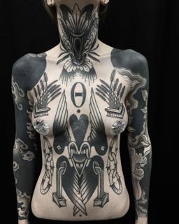 Blackwork ornamental ornamental chest tattoo by @danetattoo