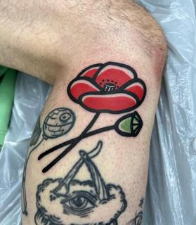 Traditional bold flower tattoo by @mikotattoo