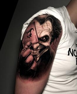 Realism joker portrait tattoo by @painciler