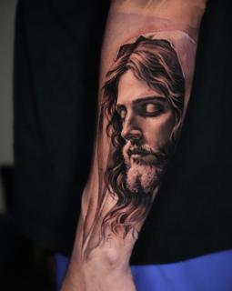 Realism jesus portrait tattoo by @goldy_z