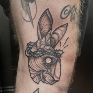 Blackwork crowned rabbit tattoo by @gracetattoo