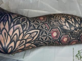 Geometric geometric patterns tattoo by @hannyajaynetattoo