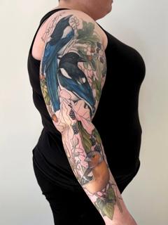 Realism bird sleeve tattoo by @hattiejcox_tattoo