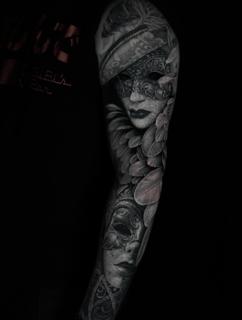 Realism venetian masks tattoo by @hellekarger_tattoo