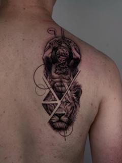 Dotwork lion and figure tattoo by @himiko.ink
