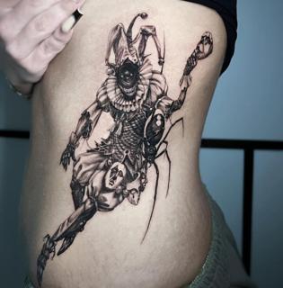 Illustrative creepy jester spider tattoo by @60needle