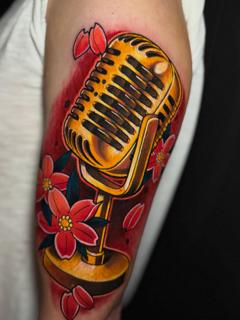 Traditional vintage microphone tattoo by @illson_ntc