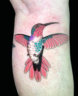 Traditional hummingbird tattoo by @inmatattooartist