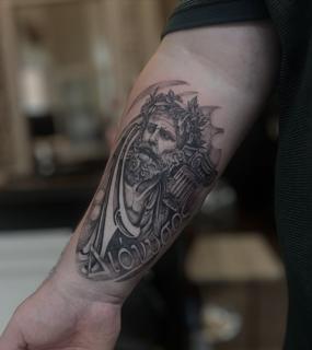 Realism greek god portrait tattoo by @steinbach_art