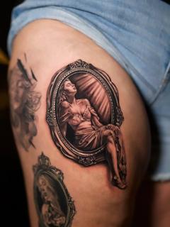 Realism reclining woman tattoo by @jakebarneyfromstatefarm