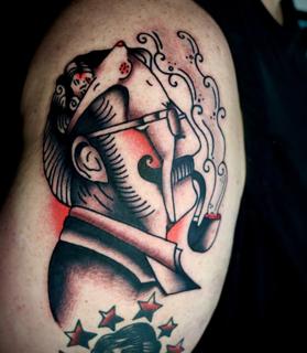 Traditional pipe smoker tattoo by @straats_tatts