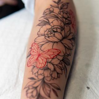Illustrative floral butterfly tattoo by @jimi.james.tattoos