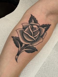 Traditional blackwork rose tattoo by @joegarey_tattoo