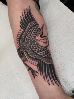 Traditional flying crane tattoo by @joegarey_tattoo