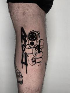 Linework gun hand tattoo by @outofprison_