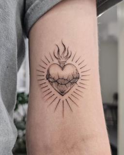 Fine line sacred heart tattoo by @paradox_tattoos