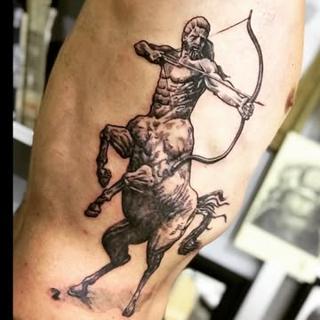 Black and grey realism centaur archer tattoo by @ztattoofloripa