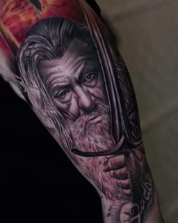 Realism wizard portrait tattoo by @jl.tattooart