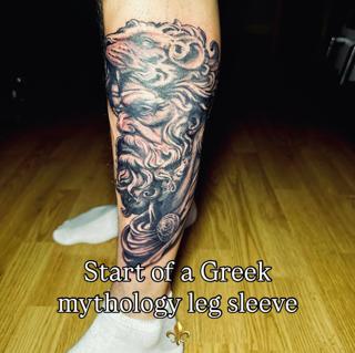 Realism greek god lion tattoo by @j_c_tattoos