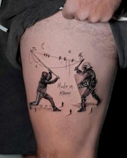 Realism protest scene tattoo by @kallia_tatts