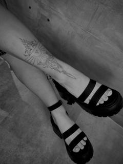 Fine line floral dagger tattoo by @kat_blink_tattoo