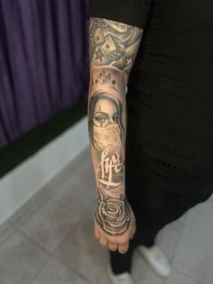 Black and grey realism bandana woman tattoo by @katia.iink