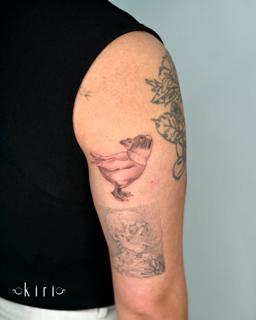 Fine line flying pig tattoo by @kiri.vrs