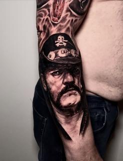 Realism portrait with skull hat tattoo by @lazaros_brone