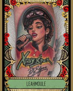 Realism singer portrait tattoo by @leahmoule