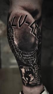 Realism alien creature tattoo by @leandros_argyropoulos_