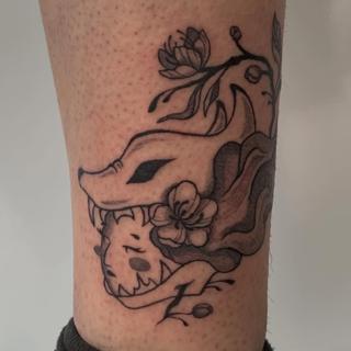 Illustrative fox mask floral tattoo by @deyatatts