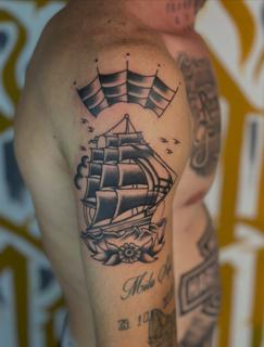 Traditional sailing ship tattoo by @no.karate.in.the.pit