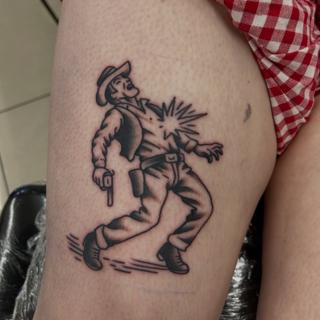 Traditional shot cowboy tattoo by @ashestattoo