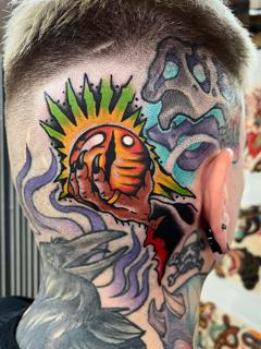 Traditional eye in hand tattoo by @lewismckechnie